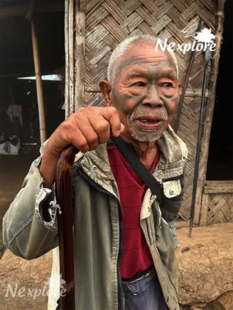 Tattooed headhunter in Hongphoi village